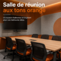 Salle de réunion moderne avec des éléments décoratifs orange.